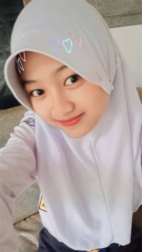 Bokep Cantik Smp pembicara hijab kemudian tambah musik latar yang cerdas image 1